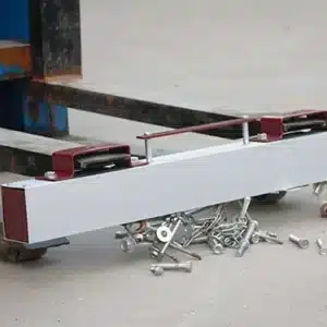 Magnetic Sweeper on a Forklift picking up bolts and screws